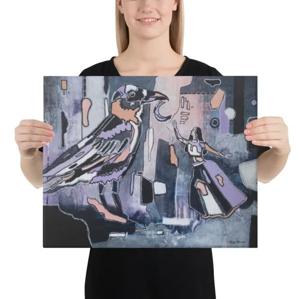 Canvas print woman and raven with moon Key to Freedom big size held by a person